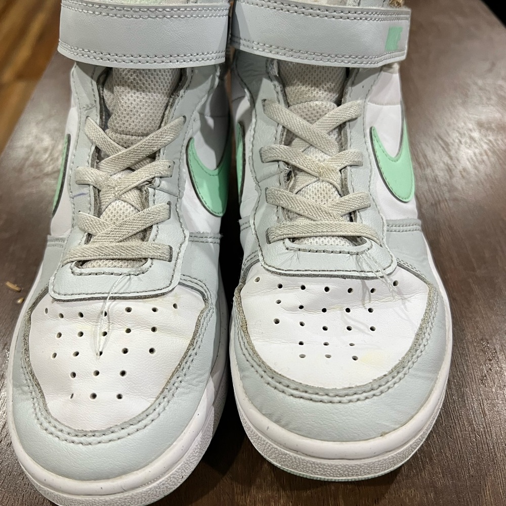 Mint green and white Nike